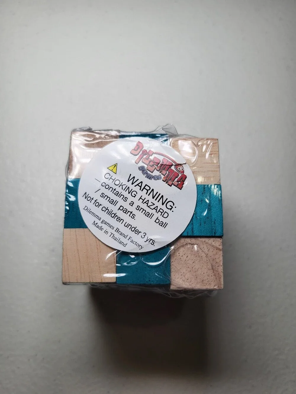 Wooden Puzzle Cube with Teal Accent